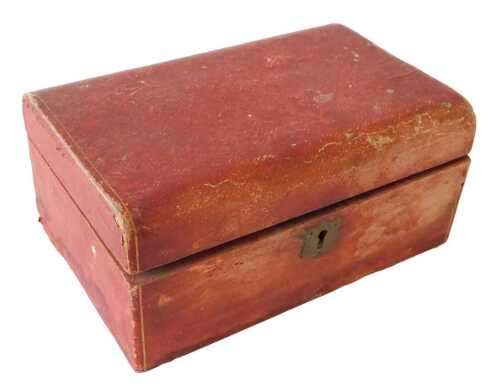 A late Victorian red tooled leather jewellery box, the hinged lid enclosing a tray, 10cm high,...