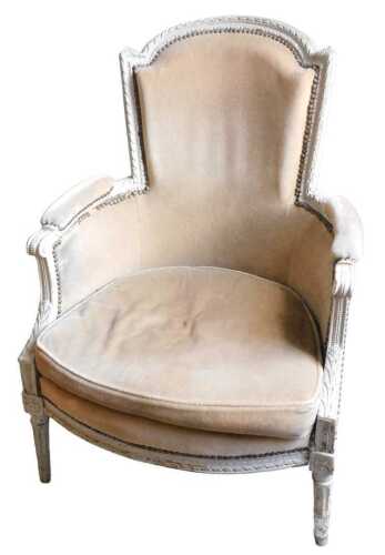 A late 19th/early 20thC French cream painted armchair, the moulded frame decorated with ribbons,...