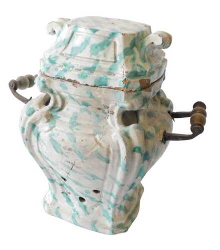 A late 18th/early 19thC French Faience portable stove, with iron and turned wooden handles,...