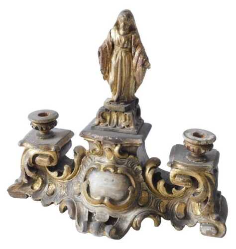 A late 17th/early 18thC Italian giltwood and gesso candle stand, with a central figure flanked...