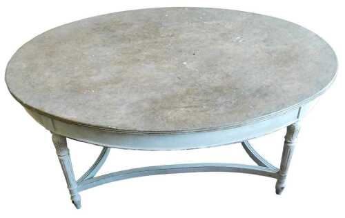 An oval coffee table, the painted simulated marble top with a reeded edge, on leaf carved part...