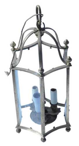 A brass hanging lantern, with turned finials, concave glass, and fitting for three bulbs, 94cm...