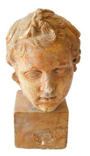 A Continental painted plaster bust of a child, on a square plinth, 33cm high. Offsite Sale -...