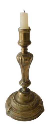 A late 18th/early 19thC French brass candlestick, with a moulded baluster stem, and a domed foot,...