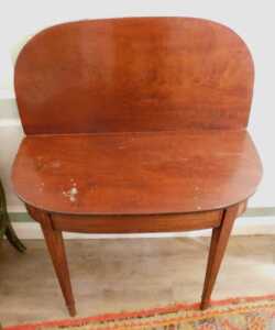 A George III mahogany and ebony strung tea table, the D shaped top hinged to reveal a polished... - 2