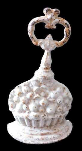 A 19thC cast iron door stop, formed as a bowl of fruit, with hook top on D-end base, painted...