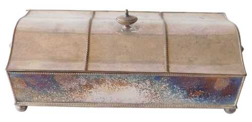 An Edwardian silver plated ink stand, of rectangular serpentine form, with urn finial, the...
