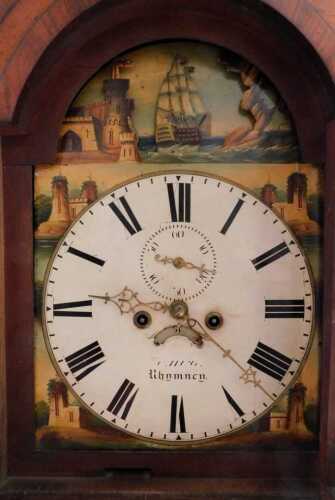 A 19thC oak and mahogany rocking ship eight day longcase clock, the 32cm wide painted Roman...