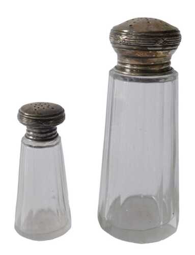 An early 20thC caster, with cut glass body and plated lid, 14cm high, and another smaller. (2)...
