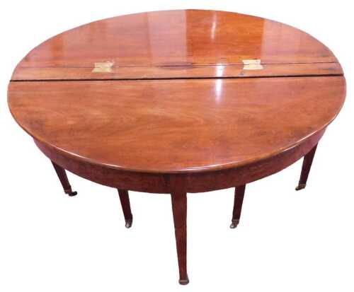 A 19thC mahogany extending dining table, the oval top raised on square tapering legs,...