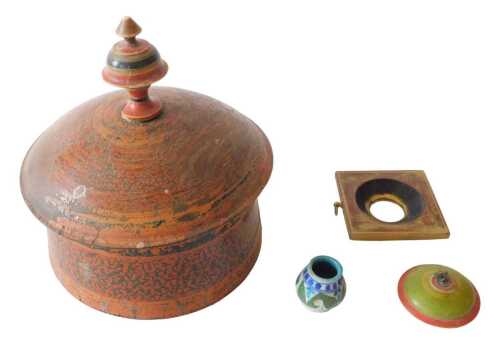 An Indian spice box, of circular form, with domed lid and turned knop, profusely decorated and...