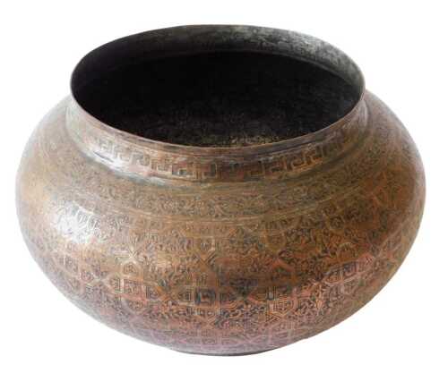 A 19thC copper bowl or spitoon, of circular form, with a repeat geometric pattern, possibly...