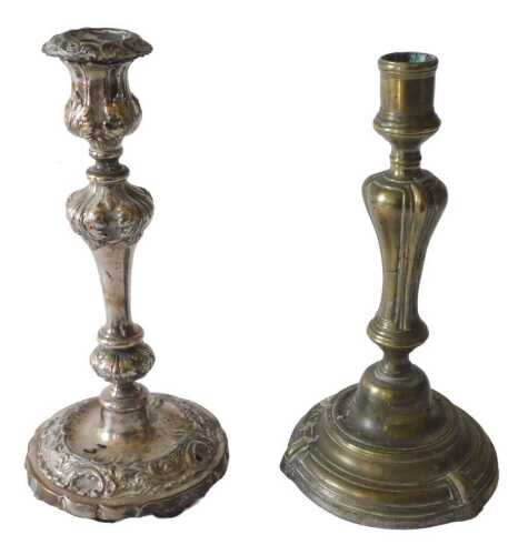 A 19thC silver plated candlestick, with classical urn sconce, on plain stem, with bellied scroll...