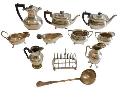 Various silver-plated ware, a three piece tea service, comprising a teapot of cape form with...
