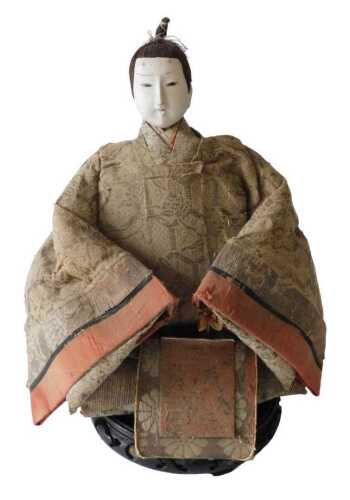 A Japanese costume doll, of a gentleman wearing a silk kimono, 35cm high, and an associated...
