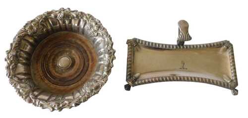 A 19thC silver plated rectangular candle snuffer tray, with engraved crest, on ball and claw...