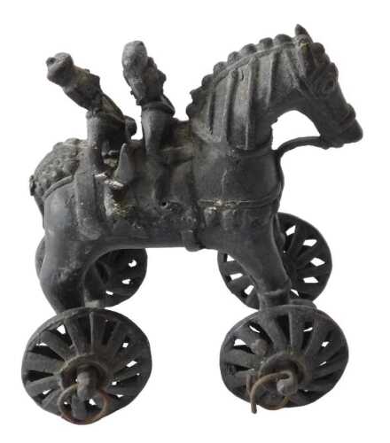 An Eastern bronzed metal pull along horse toy, 12cm long. Offsite Sale - Buying & Collecting...