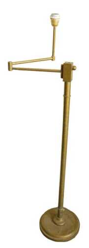 A Continental brass adjustable standard lamp, on a cylindrical column and circular domed foot,...