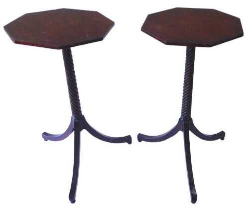 A pair of Regency mahogany occasional table or plant stands, the octagonal top on a spirally...