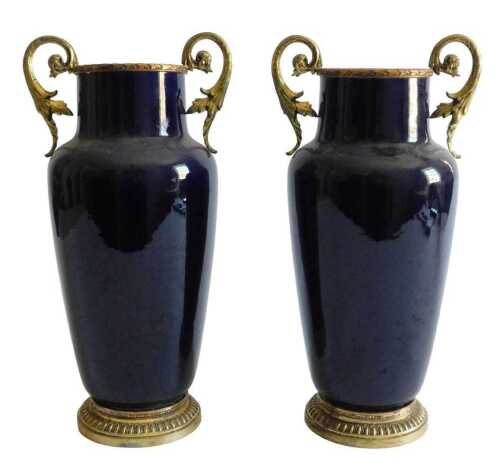 A pair of French blue glazed vases, each with gilt metal mounts, with scrolling handles, 33cm...