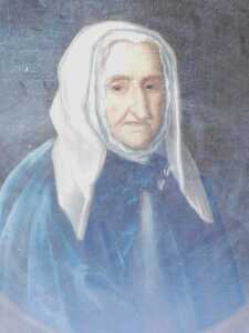 Early 19thC English School. Mrs Chapman, portrait of her as an elderly lady, half length, with...