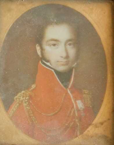 A 19thC portrait print of an officer, wearing a red tunic, 5cm x 4cm oval. Offsite Sale - Buying...