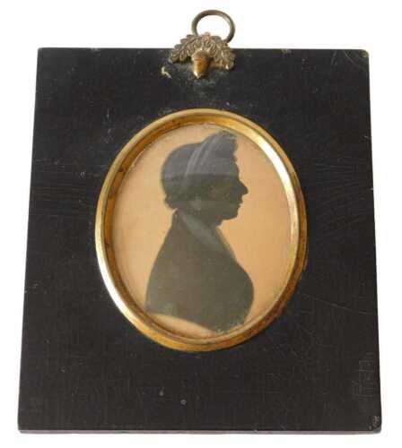 A 19thC portrait silhouette, of a lady wearing a bonnet, 8cm x 6cm oval. Offsite Sale - Buying &...