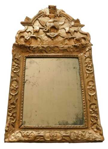 An 18thC and later gilt gesso wall mirror, the associated crest decorated with hoho bird,...