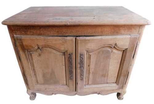 A late 18th/early 19thC French Provincial fruitwood side cabinet, the planked tapering top with...