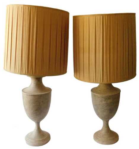 A pair of toleware lamp bases, each painted in cream and grey to simulate marble, with dark...