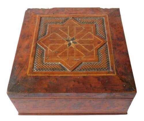 A 19thC yew and walnut workbox, the square top with a carved and inlaid star motif, 11cm high,...