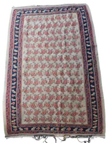 A Persian Seneh Kilim rug, with a design of flowers and leaves, on a cream ground, three narrow...