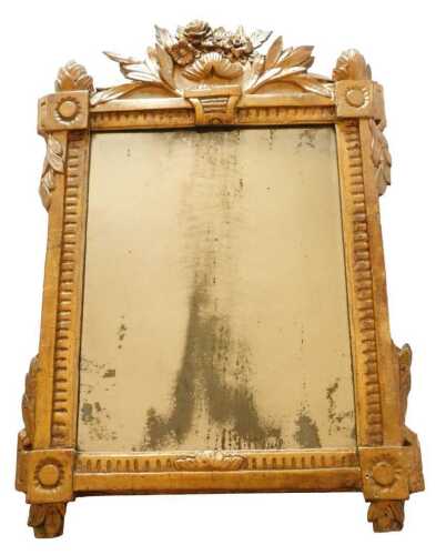 An 18thC Italian giltwood and gesso wall mirror, the crest decorated with flowers and leaves,...