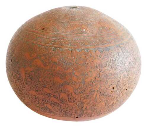 An Eastern gourd, in fine incised decoration of flowers and trees, 14cm diameter. Offsite Sale -...
