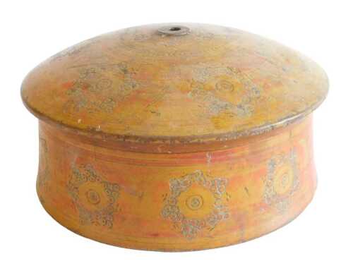 An Indian turned wood and painted box and cover, decorated with roundels, on an orange and...