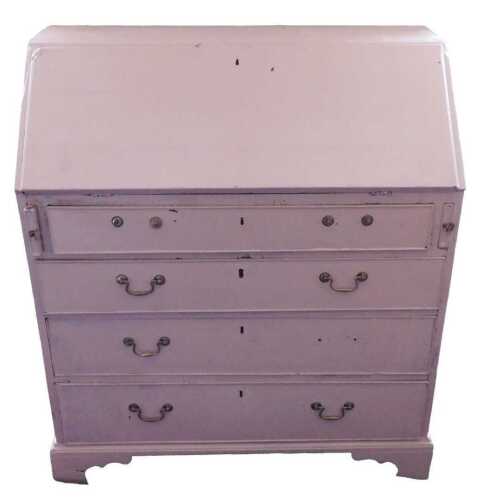 A George III mahogany bureau, the fall enclosing a fitted interior, above four graduated drawers,...