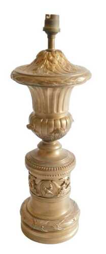 A French gilt metal table lamp base, cast with leaves, beads, flutes, etc., 42cm high. Offsite...