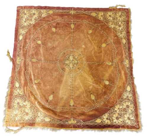A 19thC Turkish Ottoman Empire deep red velvet tablecloth, decorated in gold coloured thread,...