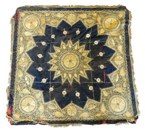 A Turkish Ottoman tablecloth, embroidered in gold and silver metallic fabric, centred with a...