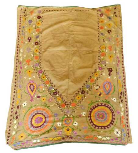 An Eastern Suzani prayer rug, with an arch or mihrab, surrounded by a design of flowers and...