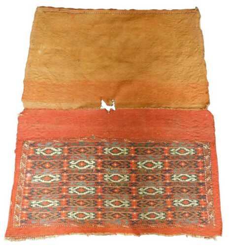 A Turkoman juval, with a design of red lozenges, on a multicoloured background, with one narrow...