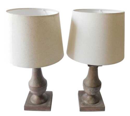 A pair of modern composition table lamps, with fine reeded decoration, on a baluster column and...