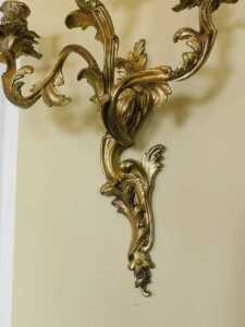A pair of late 19thC Louis XV style rococo style gilt metal three-branch wall sconces, each with... - 4