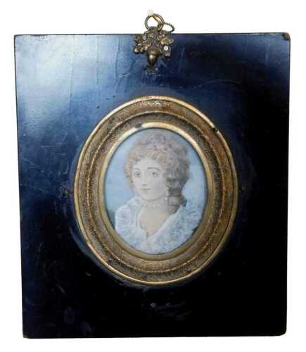 A 19thC oval portrait miniature of a lady, in white dress and pearl necklace, stipple engraving...