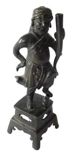A 19thC Chinese bronze figure of a warrior holding a quiver, on a pierced tapering base, 23cm...