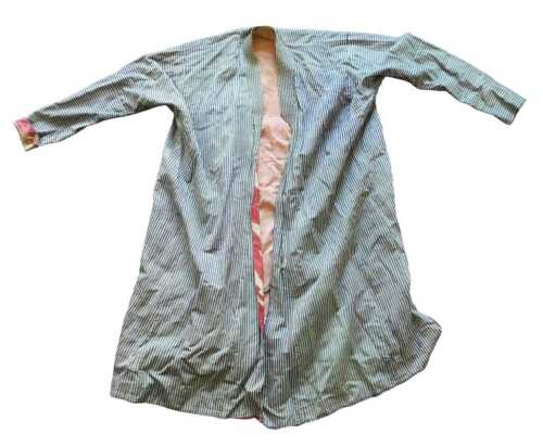 An Afghan coat, with a design of blue and white stripes, with Ikat lining, etc. Offsite Sale -...