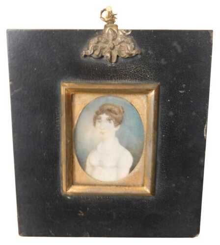 An early 19thC oval portrait miniature, of a young lady in a white silk dress, 5.5cm x 6.5cm....