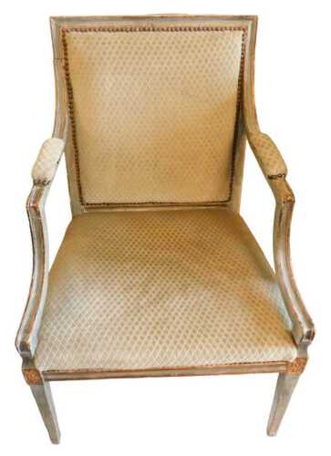 A 19thC Louis XVI style fauteuil armchair or elbow chair, with moulded arm supports, on square...