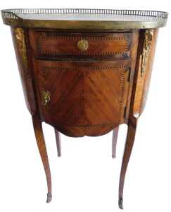 A late 19thC Louis XVI style kingwood cabinet, the marble top in a pierced gallery, above a...