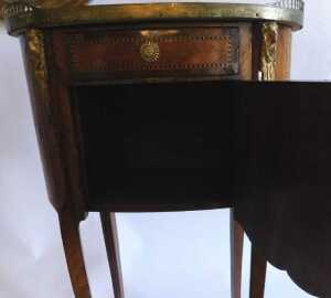A late 19thC Louis XVI style kingwood cabinet, the marble top in a pierced gallery, above a... - 2